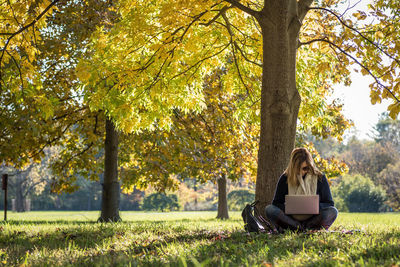 Woman sitting in park