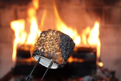 Close-up of burning outdoors at night