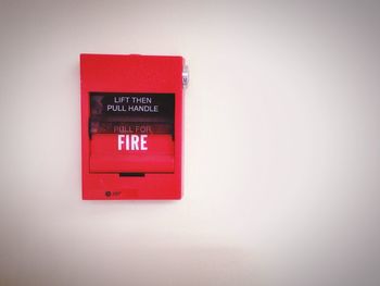 Close-up of red object over white background