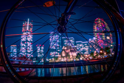 Low angle view of illuminated ferris wheel