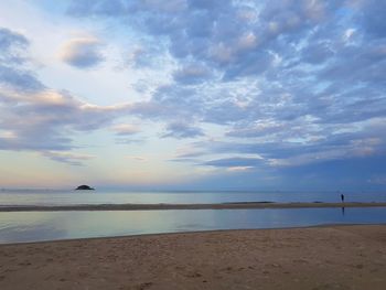 Scenic view of sea against sky at sunset