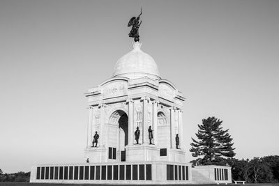 Low angle view of statue against clear sky