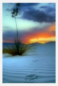 Scenic view of cloudy sky at sunset