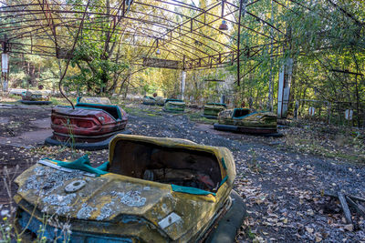 Abandoned car in forest