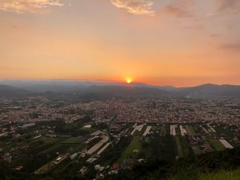 High angle view of townscape against sky during sunset