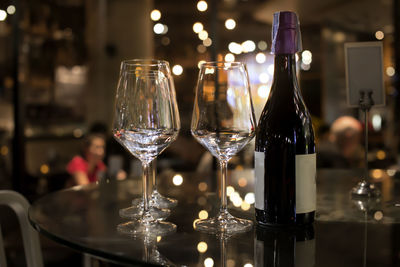 Wine bottles on table