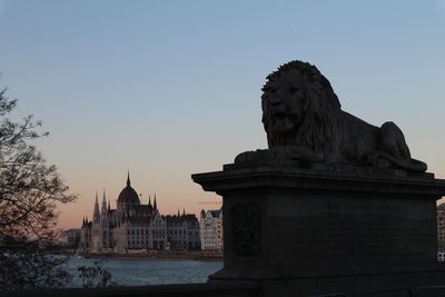 Statue of liberty against sky during sunset