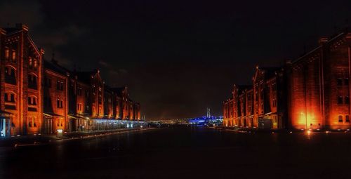 View of canal in old town at night