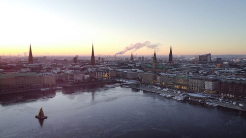 High angle view of city at sunset