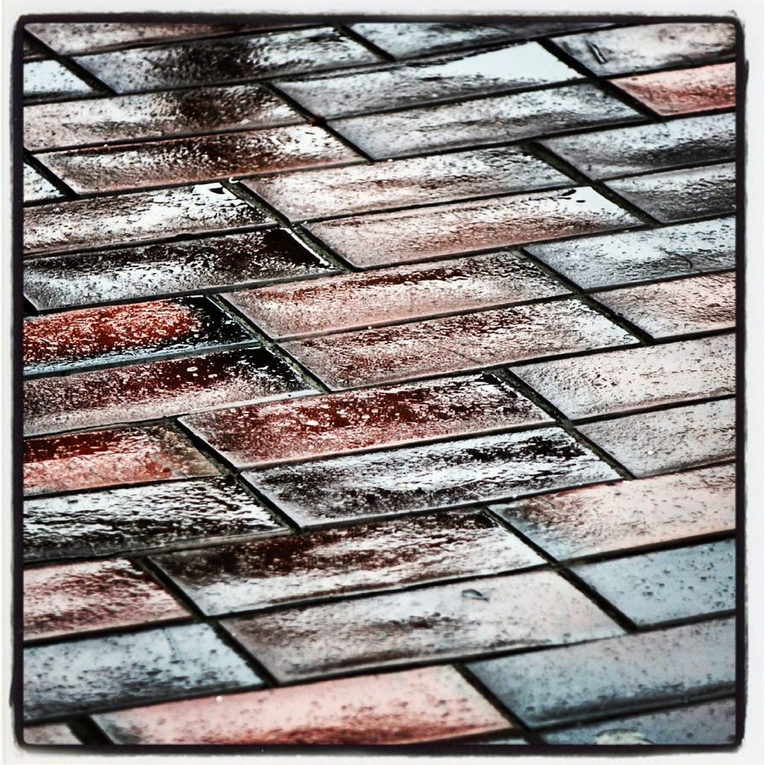 transfer print, auto post production filter, full frame, backgrounds, pattern, high angle view, textured, paving stone, close-up, cobblestone, day, no people, outdoors, sunlight, tiled floor, metal, sidewalk, street, footpath