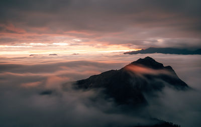 Scenic view of mountains against sky during sunset