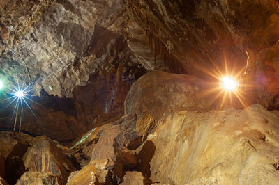 Sunlight streaming through rocks