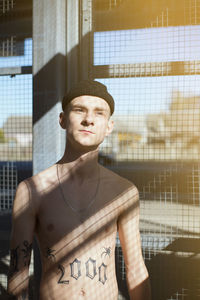 Portrait of young man looking away