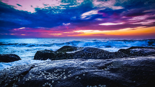 Scenic view of sea against sky during sunset