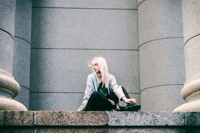 Woman sitting outdoors