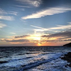 Scenic view of sea at sunset