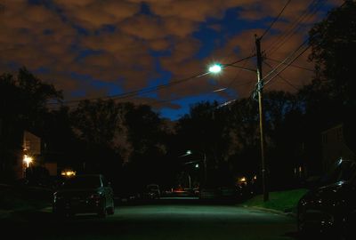 Illuminated street lights at night