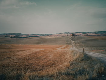 Scenic view of land against sky