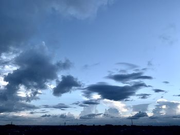 Low angle view of clouds in sky during sunset