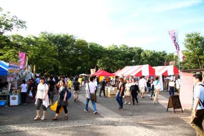 Group of people walking in market