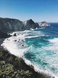 Scenic view of sea against blue sky