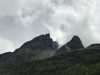 Low angle view of rocks against sky