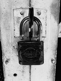 Close-up of padlock on door