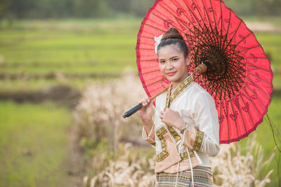 Woman holding umbrella