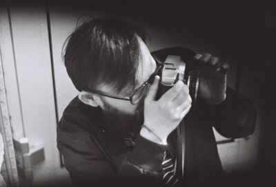 Close-up of boy photographing