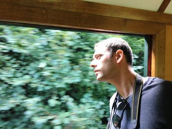 Side view of young man