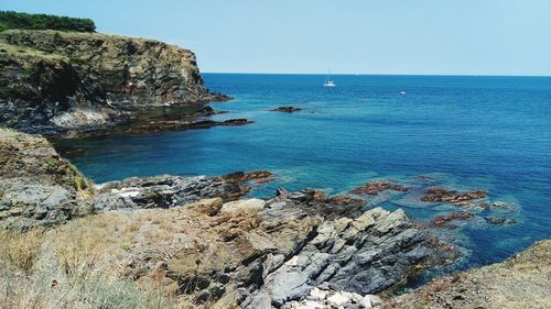 Scenic view of sea against clear sky