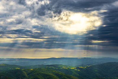 Scenic view of landscape against sky during sunset