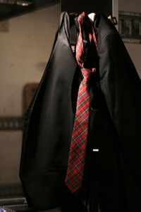 Close-up of suit and necktie on backstage