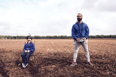 Full length of man on field against sky