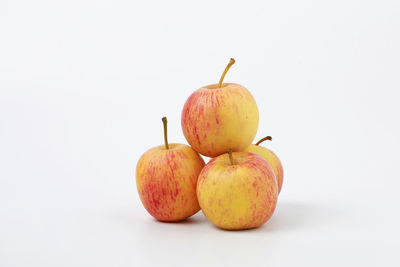 Close-up of apple against white background