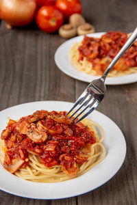 High angle view of pasta in plate on table