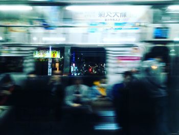 Blurred motion of people at subway station