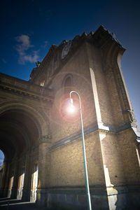 Low angle view of bell tower against sky