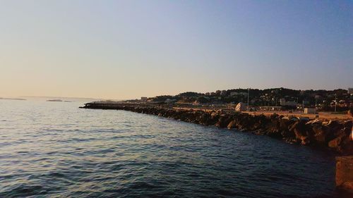 Scenic view of sea at sunset