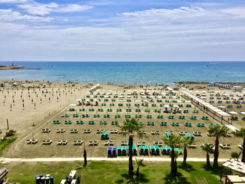 High angle view of beach against cloudy sky