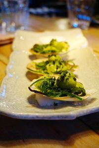 Close-up of scallops served in plate on table