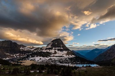 Scenic view of snowcapped mountains against sky during sunset