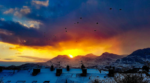 Scenic view of mountains against sky during sunset