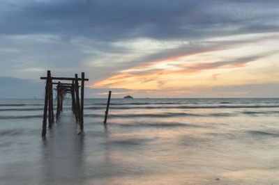 Scenic view of sea against sky at sunset