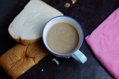 High angle view of coffee cup on table