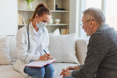 Doctor examining patient at clinic