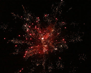 Firework display at night