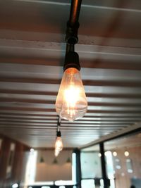 Low angle view of illuminated light bulb