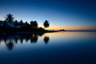 Scenic view of swimming pool against sky during sunset