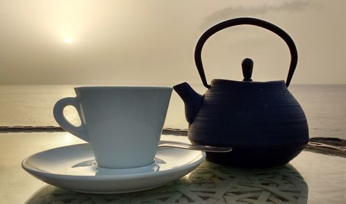 Close-up of coffee cup on table